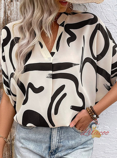 Geometric Printed Bat Sleeve Shirt